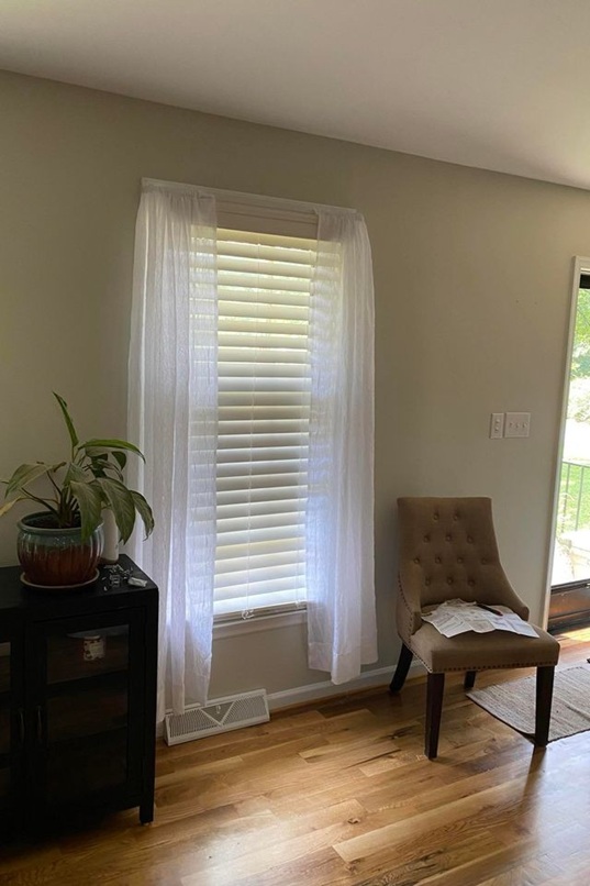 Appalachian Solid Hardwood Flooring in a Virginia Sitting Area Appalachian solid hardwood flooring in a small Virginia sitting area with a window, natural light, and accent chair.