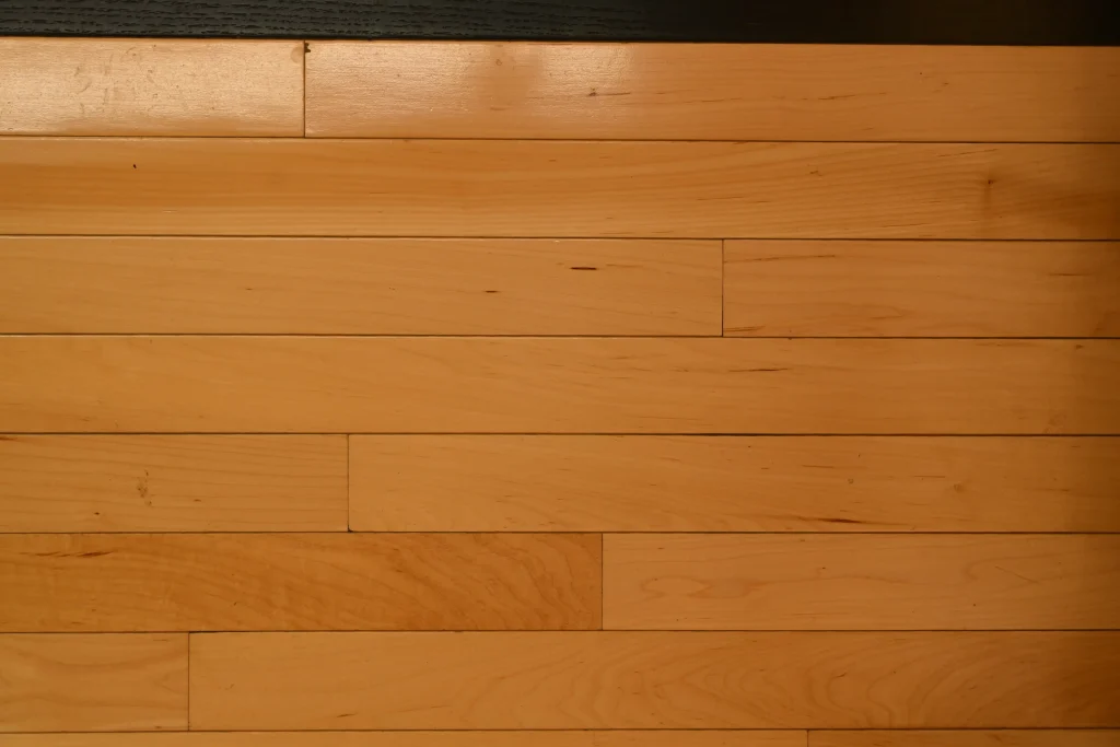 Choice grade Golden Red Oak prefinished hardwood flooring with micro-bevel edges and a protective urethane finish.