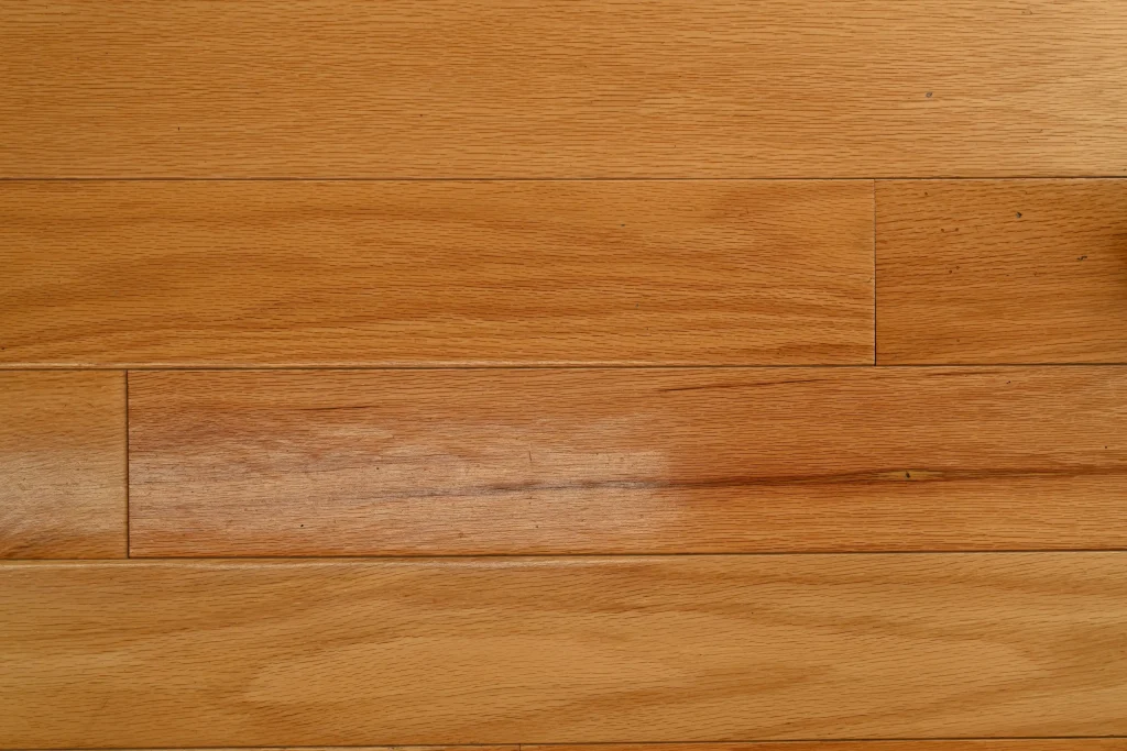Mill Run Natural Red Oak prefinished hardwood flooring featuring micro-bevel edges and a clear protective finish.