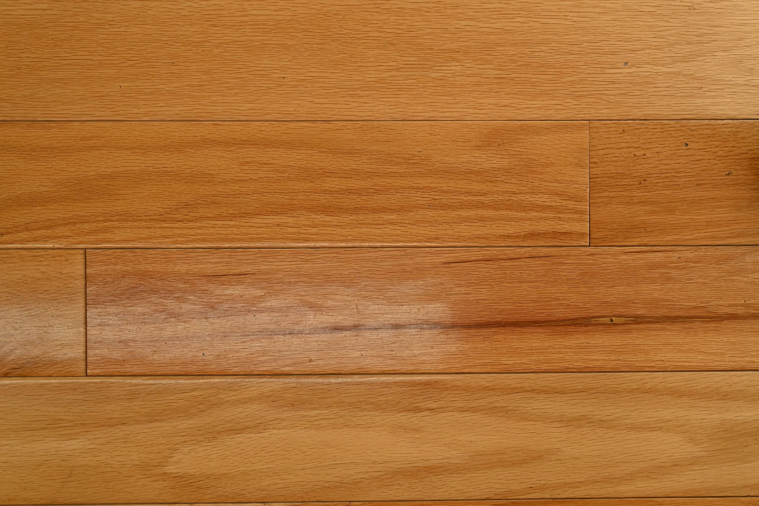 Natural Red Oak Mill Run Natural Red Oak prefinished hardwood flooring featuring micro-bevel edges and a clear protective finish.