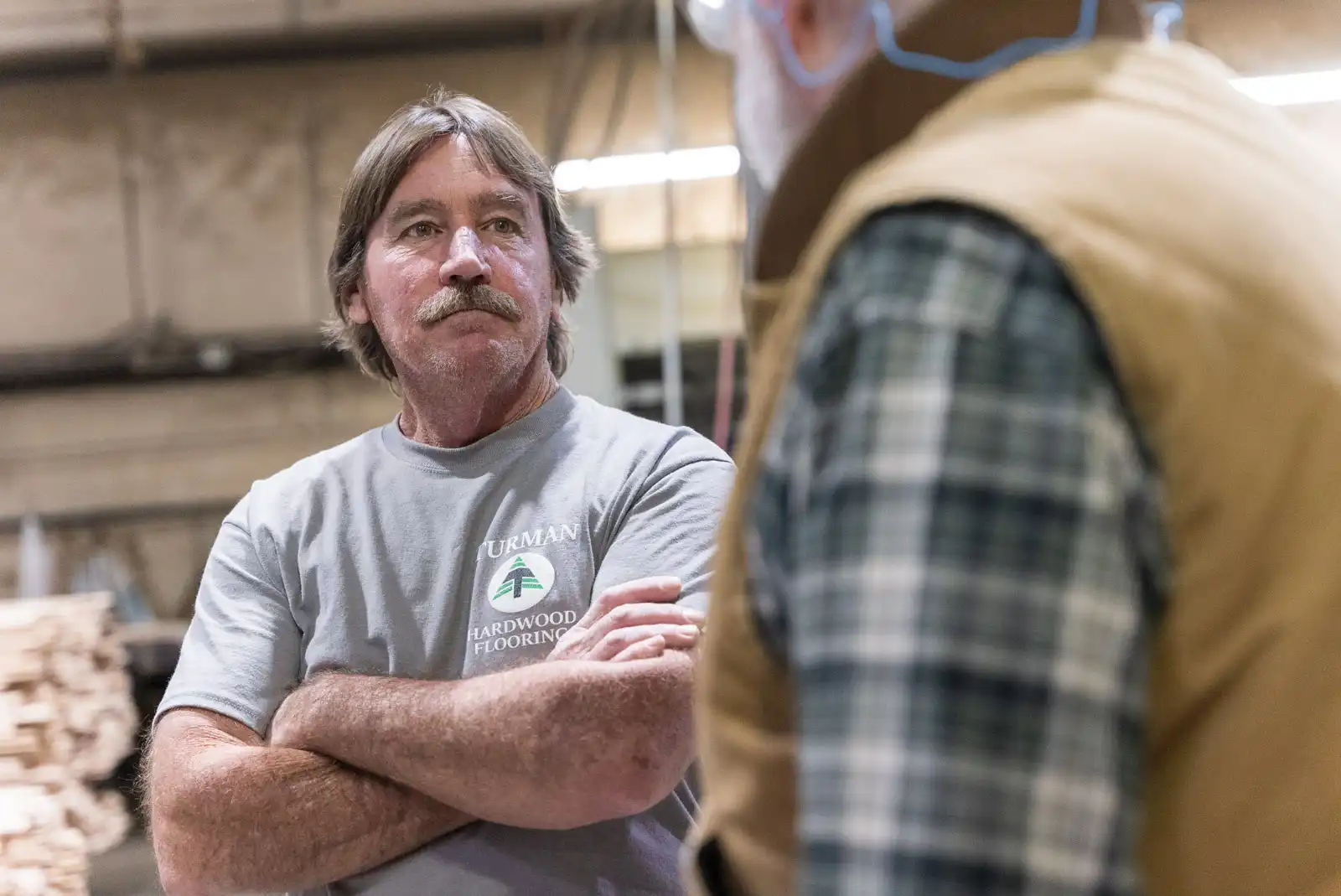On the Factory Floor - Turman Hardwood Flooring Appalachian hardwood flooring manufacturer employee on the factory floor in Galax, Virginia.